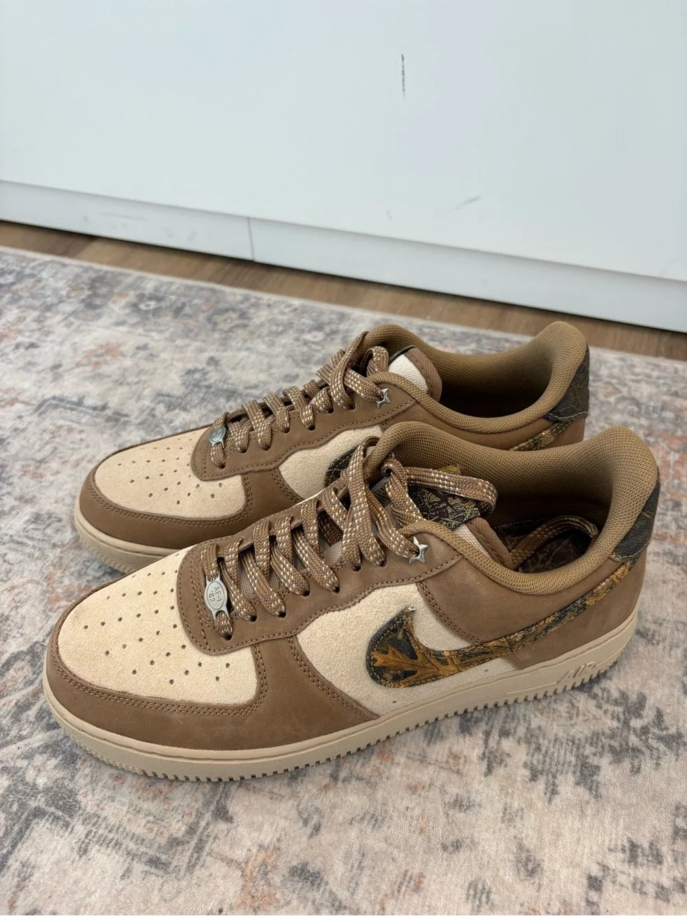 Nike Low-Top Sneakers in Brown & Tan with Patterned Swoosh